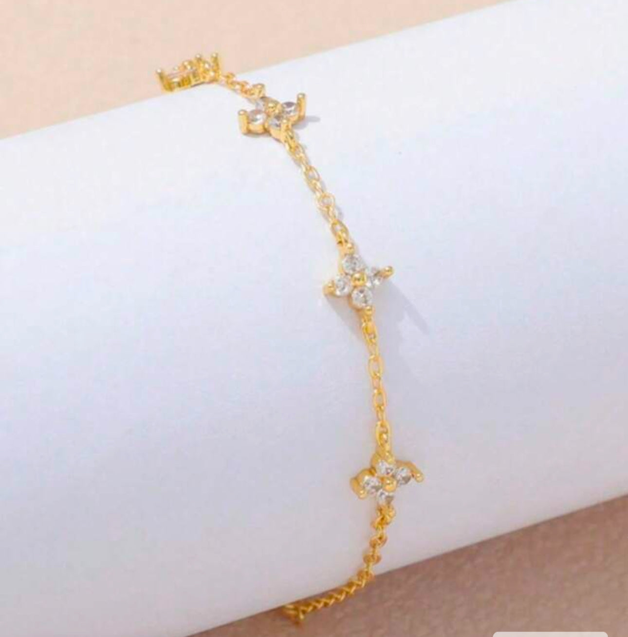 Bracelet doré femme fleuris en zirconium