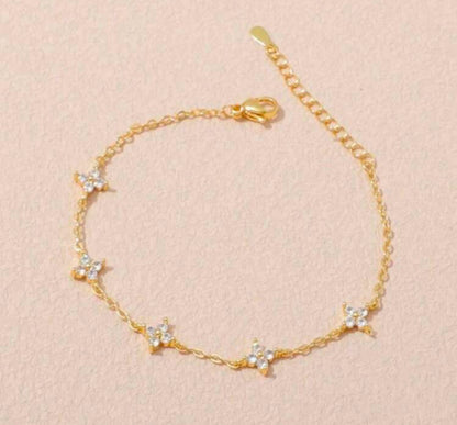 Bracelet doré femme fleuris en zirconium