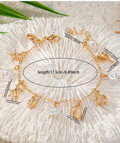 Bracelet Charms Coquillage – Évasion Plage & Soleil
