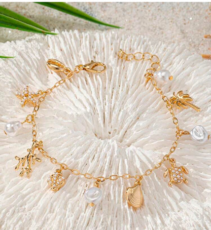 Bracelet Charms Coquillage – Évasion Plage & Soleil